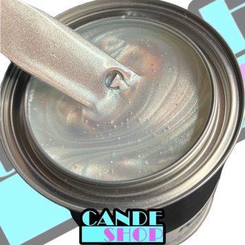 unreduced Brain Freeze Chameleon Paint in a quart can with a stainless steel mixing stick being pulled out to show the transparent silver to blue chameleon color shift