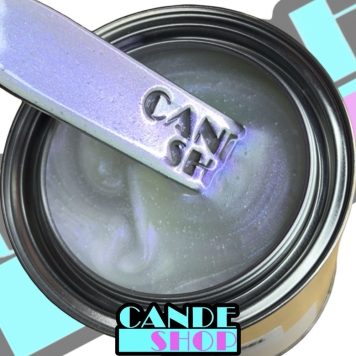 unreduced Everything Bagel Chameleon Paint in a quart can with a stainless steel mixing stick being pulled out to show the purple, pink, blue, gold and green chameleon color shift