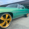 glasshouse donk painted in outrageous paint daytona beach