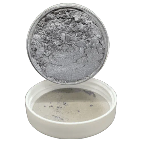 rollin' coal pearl powder in jar spilling onto lid