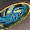 two-tone gold rims made with pineapple urethane cande and bondi beach pearl coat on a rucci wheel