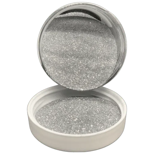 .004" sirius silver metal flake in jar spilling onto the lid in front of it