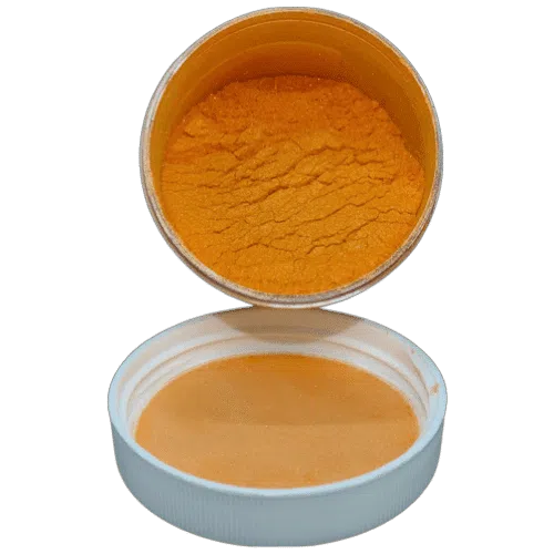 tang-u-rite pearl in a jar spilling onto a white lid underneath it
