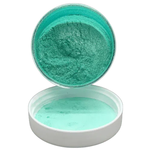 tree frog green pearl in jar spilling onto the lid in front of it